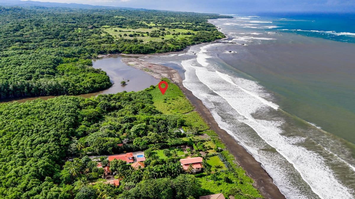 Beachfront lot for sale in Playa Junquillal, Costa Rica, offering ocean views and prime real estate investment opportunity.