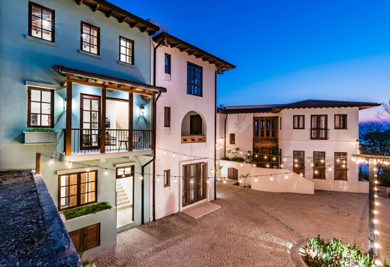 Casa Acuarela: a resale 4-bedroom home in Las Catalinas, adorned with coastal-inspired artworks by Arlo Coles. Offering luxury living amidst natural beauty, it's your vibrant retreat with beach access and hiking trails nearby.