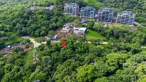 Aerial view of Sauco Lot #14 in Reserva Conchal, Costa Rica, showcasing its proximity to Playa Conchal beach.