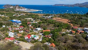 Aerial view of Casa Nalifos in Altos de Flamingo with ocean views and walking distance to Playa Flamingo beach, Costa Rica.