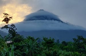 Breathtaking panoramic views of Arenal Volcano and the lush tropical rainforest from a luxury mountain retreat in Costa Rica." Title: "Spectacular Arenal Volcano & Rainforest Views – A Luxury Escape in Costa Rica" Caption: "Wake up to stunning panoramic views of Arenal Volcano and the lush Costa Rican rainforest. Experience the beauty of nature from your private terrace, balcony, or oversized windows." Description: "This luxury mountain retreat offers unmatched panoramic views of Arenal Volcano, the surrounding tropical rainforest, and breathtaking sunrises and sunsets. Floor-to-ceiling windows, spacious balconies, and outdoor living areas ensure you’re always connected to Costa Rica’s stunning natural beauty. Whether enjoying your morning coffee, relaxing in the Jacuzzi, or unwinding in the garden, these breathtaking views create the perfect tranquil escape. Experience nature at its finest in this one-of-a-kind property.