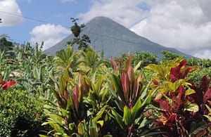 Breathtaking panoramic views of Arenal Volcano and the lush tropical rainforest from a luxury mountain retreat in Costa Rica." Title: "Spectacular Arenal Volcano & Rainforest Views – A Luxury Escape in Costa Rica" Caption: "Wake up to stunning panoramic views of Arenal Volcano and the lush Costa Rican rainforest. Experience the beauty of nature from your private terrace, balcony, or oversized windows." Description: "This luxury mountain retreat offers unmatched panoramic views of Arenal Volcano, the surrounding tropical rainforest, and breathtaking sunrises and sunsets. Floor-to-ceiling windows, spacious balconies, and outdoor living areas ensure you’re always connected to Costa Rica’s stunning natural beauty. Whether enjoying your morning coffee, relaxing in the Jacuzzi, or unwinding in the garden, these breathtaking views create the perfect tranquil escape. Experience nature at its finest in this one-of-a-kind property.