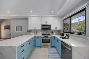 Modern Renovated Kitchen with Custom Cabinets and Pool Views at Casa Nueva Vida