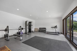 Private home gym with modern equipment and ample space at Casa Seahorse in Mar Vista, Playa Flamingo.