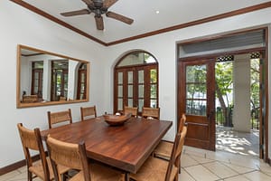 Elegant ocean-view dining area with seamless indoor-outdoor living at 9 Paseo del Mar, Las Catalinas.