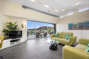 Spacious living room with ocean views at Casa Nalifos in Playa Flamingo, Costa Rica.