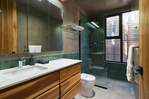 Luxurious modern bathroom at Villa Aquarena with elegant finishes and natural light