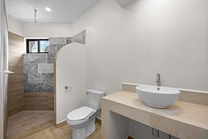 Elegantly designed bathroom at Casa Camari featuring high-end finishes, custom vanities, and a spa-like ambiance.