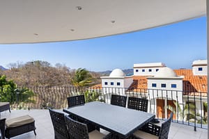 Ocean-view balcony accessed from the living room at Flamingo Towers 11 in Playa Flamingo, Costa Rica.