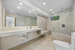 Luxury bathrooms with modern features at Casa Nalifos, Playa Flamingo, Costa Rica.