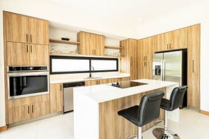 Modern Kitchen with Open Layout and High-End Appliances in Pacifico Resort Home