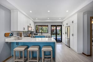 Modern Renovated Kitchen with Custom Cabinets and Pool Views at Casa Nueva Vida