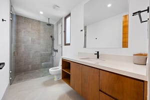 Luxurious modern bathroom with high-end finishes at Tamarindo Park #51 in Playa Tamarindo, Costa Rica.