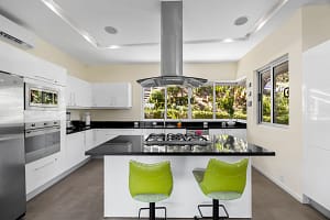 Modern gourmet kitchen with Italian Smeg appliances at Casa Nalifos, Playa Flamingo, Costa Rica.