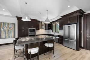 Modern chef’s kitchen with high-end appliances, sleek countertops, and ocean views at 360 Splendor del Pacifico Flamingo, Unit 502.