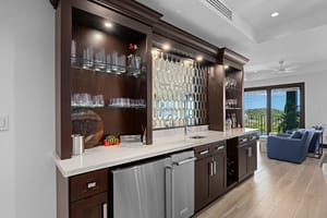 Modern chef’s kitchen with high-end appliances, sleek countertops, and ocean views at 360 Splendor del Pacifico Flamingo, Unit 502.