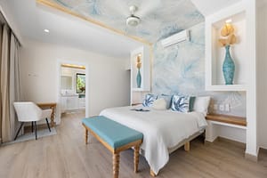 Stylish and uniquely designed bedrooms at Casa Camari, each featuring elegant furnishings, custom decor, and stunning ocean or mountain views.