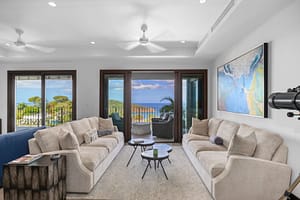 Spacious and elegant living room with ocean views, modern furnishings, and floor-to-ceiling windows at 360 Splendor del Pacifico Flamingo, Unit 502.