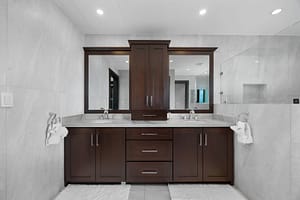 Spa-like bathroom with a glass-enclosed shower, elegant vanity, and ocean views at 360 Splendor del Pacifico Flamingo.