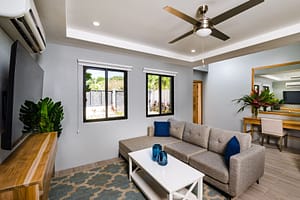 Bright and Open Living Room with Pool Views at Casa Nueva Vida in Surfside Estates