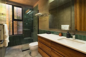 Luxurious modern bathroom at Villa Aquarena with elegant finishes and natural light