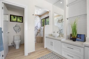 Elegantly designed bathroom at Casa Camari featuring high-end finishes, custom vanities, and a spa-like ambiance.