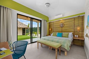 Stylish and uniquely designed bedrooms at Casa Camari, each featuring elegant furnishings, custom decor, and stunning ocean or mountain views.