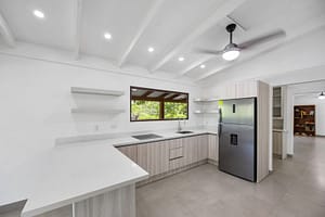 Modern remodeled kitchen at Casa Mango with upgraded countertops, new flooring, and stylish cabinetry in Playa Grande, Costa Rica.