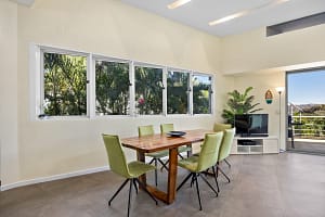 Elegant dining area with ocean views at Casa Nalifos in Playa Flamingo, Costa Rica.