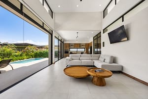 Spacious Living Room with High Ceilings and Modern Design in Pacifico Resort Home