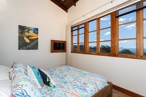 Elegant and airy bedroom with ocean views at 42 Carlota, a luxury penthouse in Las Catalinas.