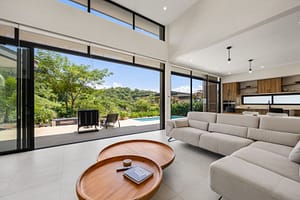 Spacious Living Room with High Ceilings and Modern Design in Pacifico Resort Home