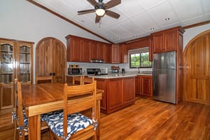Modern, fully equipped kitchen with high-end appliances, sleek countertops, and a spacious layout in a luxury retreat near Arenal Volcano, Costa Rica.