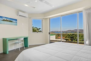 Spacious and luxurious bedrooms with ocean views at Casa Nalifos, Playa Flamingo, Costa Rica.
