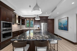 Modern chef’s kitchen with high-end appliances, sleek countertops, and ocean views at 360 Splendor del Pacifico Flamingo, Unit 502.