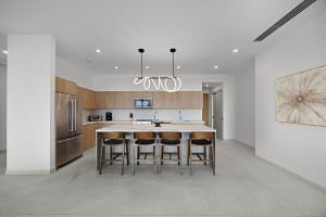 Modern gourmet kitchen at Solaris Acacia 1A in Reserva Conchal, featuring high-end appliances, sleek cabinetry, and an open-concept design.