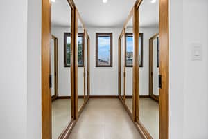 Spacious walk-in closet with custom storage in the master suite at Tamarindo Park #51 in Playa Tamarindo.