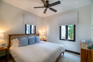 Bright and airy bedroom with private balcony overlooking Las Catalinas town at 18 Calle La Ronda Costa Rica home for sale