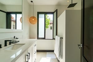 Modern bathroom with bright finishes and walk in shower at 18 Calle La Ronda Las Catalinas Costa Rica
