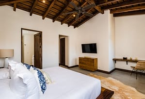 Casa Acuarela: a resale 4-bedroom home in Las Catalinas, adorned with coastal-inspired artworks by Arlo Coles. Offering luxury living amidst natural beauty, it's your vibrant retreat with beach access and hiking trails nearby.