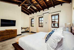 Casa Acuarela: a resale 4-bedroom home in Las Catalinas, adorned with coastal-inspired artworks by Arlo Coles. Offering luxury living amidst natural beauty, it's your vibrant retreat with beach access and hiking trails nearby.