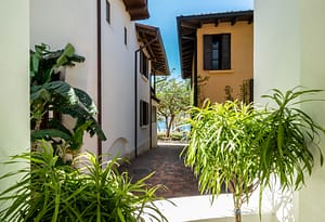 Bright and airy bedroom with private balcony overlooking Las Catalinas town at 18 Calle La Ronda Costa Rica home for sale