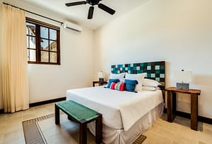 Casa Acuarela: a resale 4-bedroom home in Las Catalinas, adorned with coastal-inspired artworks by Arlo Coles. Offering luxury living amidst natural beauty, it's your vibrant retreat with beach access and hiking trails nearby.