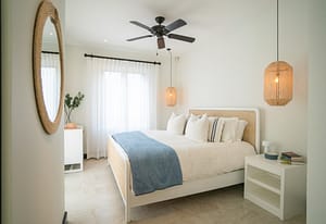 Bright and airy bedroom with private balcony overlooking Las Catalinas town at 18 Calle La Ronda Costa Rica home for sale