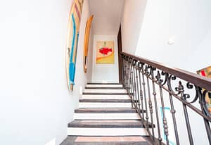 Stairs at 9 Calle Cartagena - elegant design connecting multiple storeys with ocean views