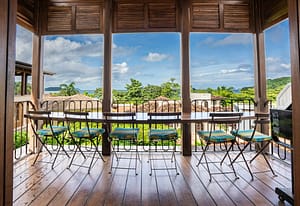 Ocean-view balcony with outdoor seating at 9 Calle La Ronda, Las Catalinas