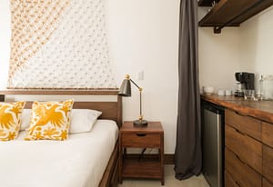 Elegant master bedroom at 9 Calle La Ronda, Las Catalinas with ocean views and modern design.