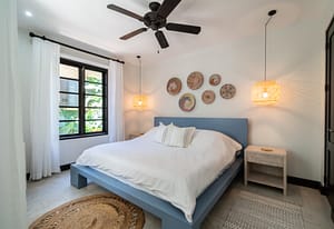 Bright and airy bedroom with private balcony overlooking Las Catalinas town at 18 Calle La Ronda Costa Rica home for sale