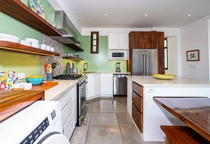 Modern gourmet kitchen at 9 Calle La Ronda, Las Catalinas with high-end appliances and sleek finishes.