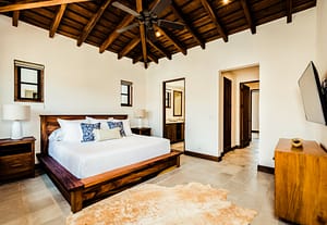 Casa Acuarela: a resale 4-bedroom home in Las Catalinas, adorned with coastal-inspired artworks by Arlo Coles. Offering luxury living amidst natural beauty, it's your vibrant retreat with beach access and hiking trails nearby.